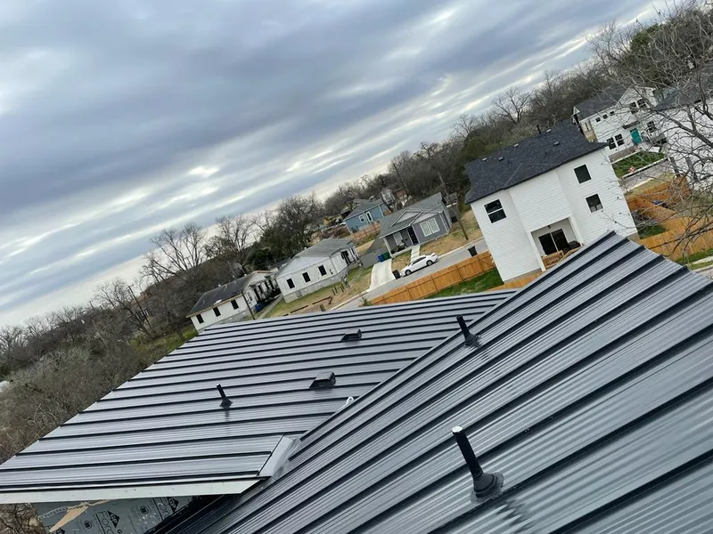 Standing seam metal roof panels with vents for Skylight Repair in Brushy Creek